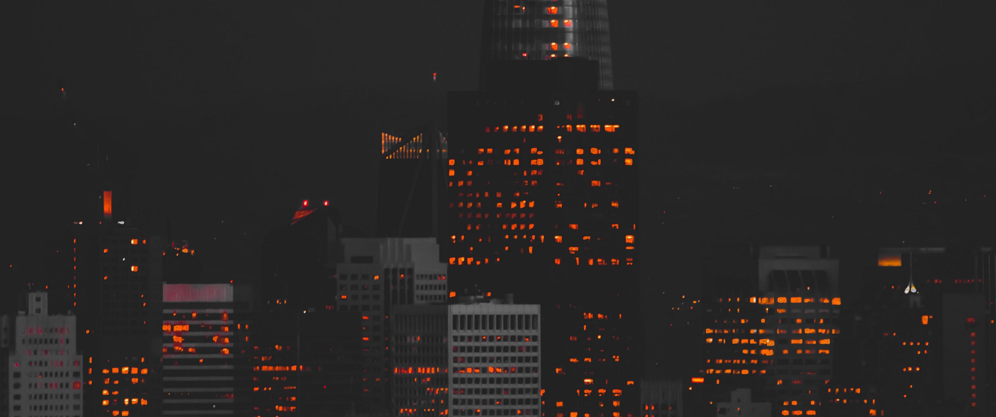 Stadt bei Nacht, Wolkenkratzer, Fensterlichter, Dunkel, 21:9, 2K-Hintergrundbild für den Desktop