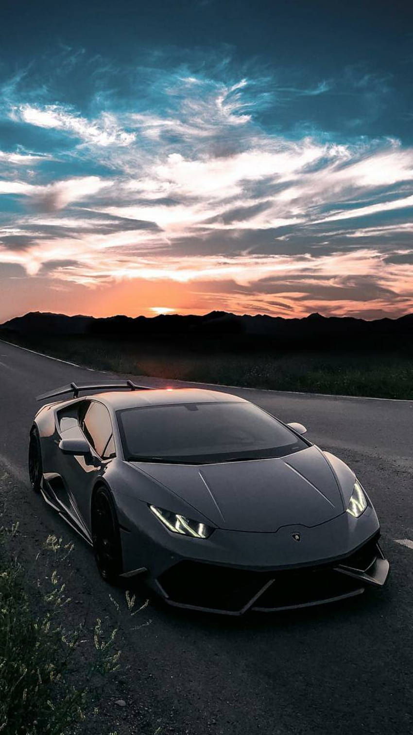 Lamborghini Huracán, Schwarzer Sportwagen, Abendhimmel, Wolken, Hochformat, HD, iPhone-Hintergrundbild
