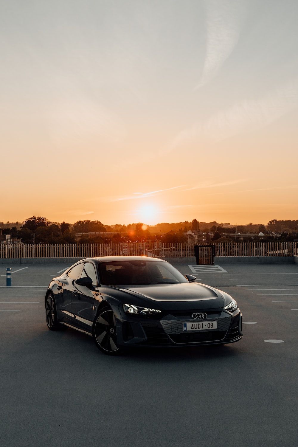 Porsche, Schwarzer Sportwagen, Sonnenuntergang, Parkplatz, Hochformat, HD, iPhone-Hintergrundbild