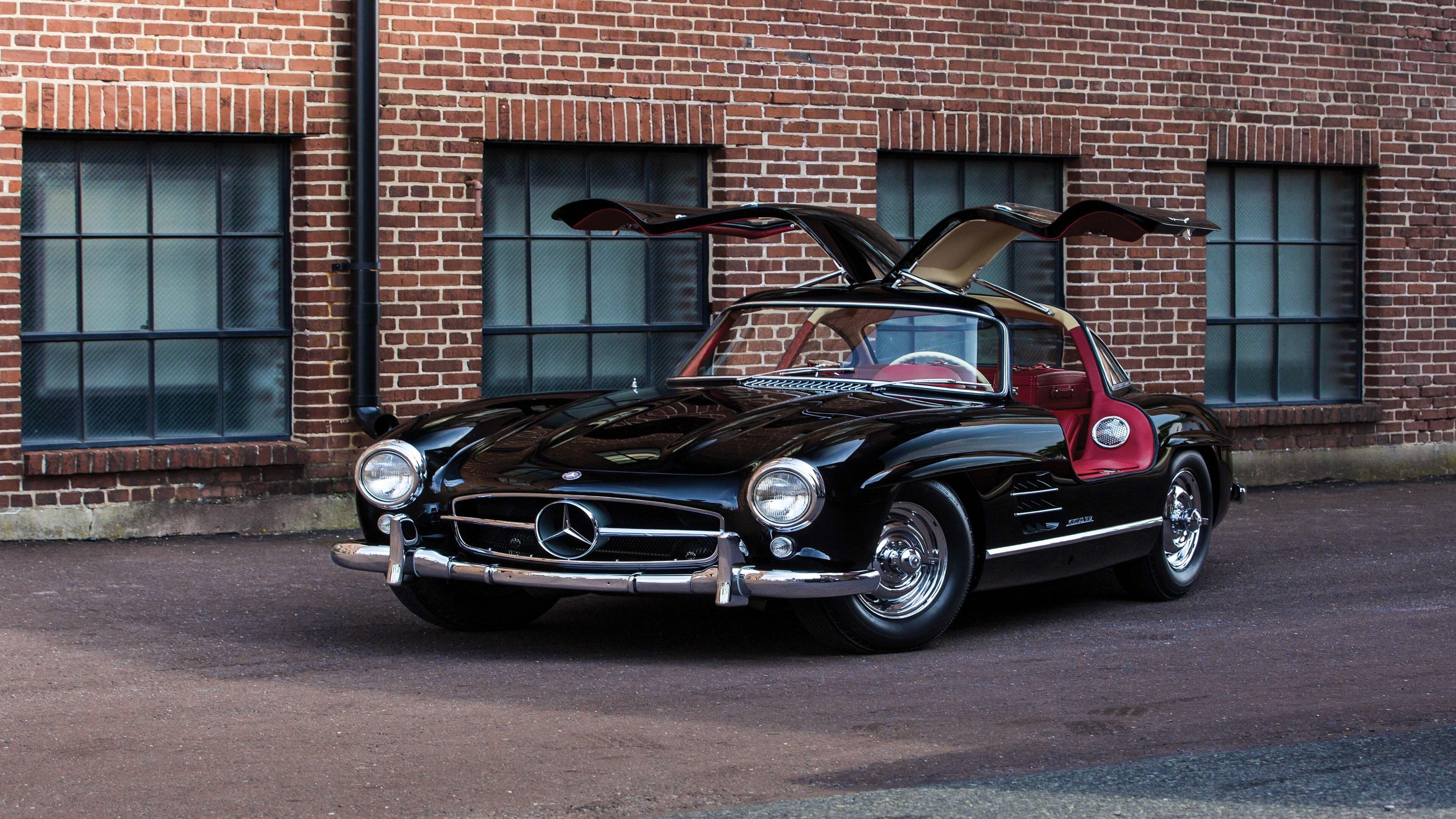 Mercedes-Benz 300 SL, Flügeltürer, Oldtimer, Schwarz, Backsteinhaus, 4K-Hintergrundbild für PC