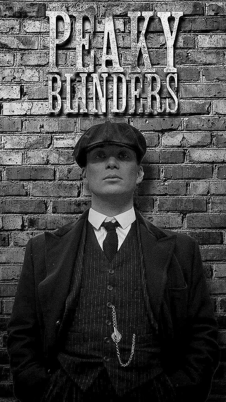 Thomas Shelby, Cillian Murphy, Peaky Blinders, Schriftzug, Ziegelwand, Schwarz-Weiß, iPhone-Hintergrundbild