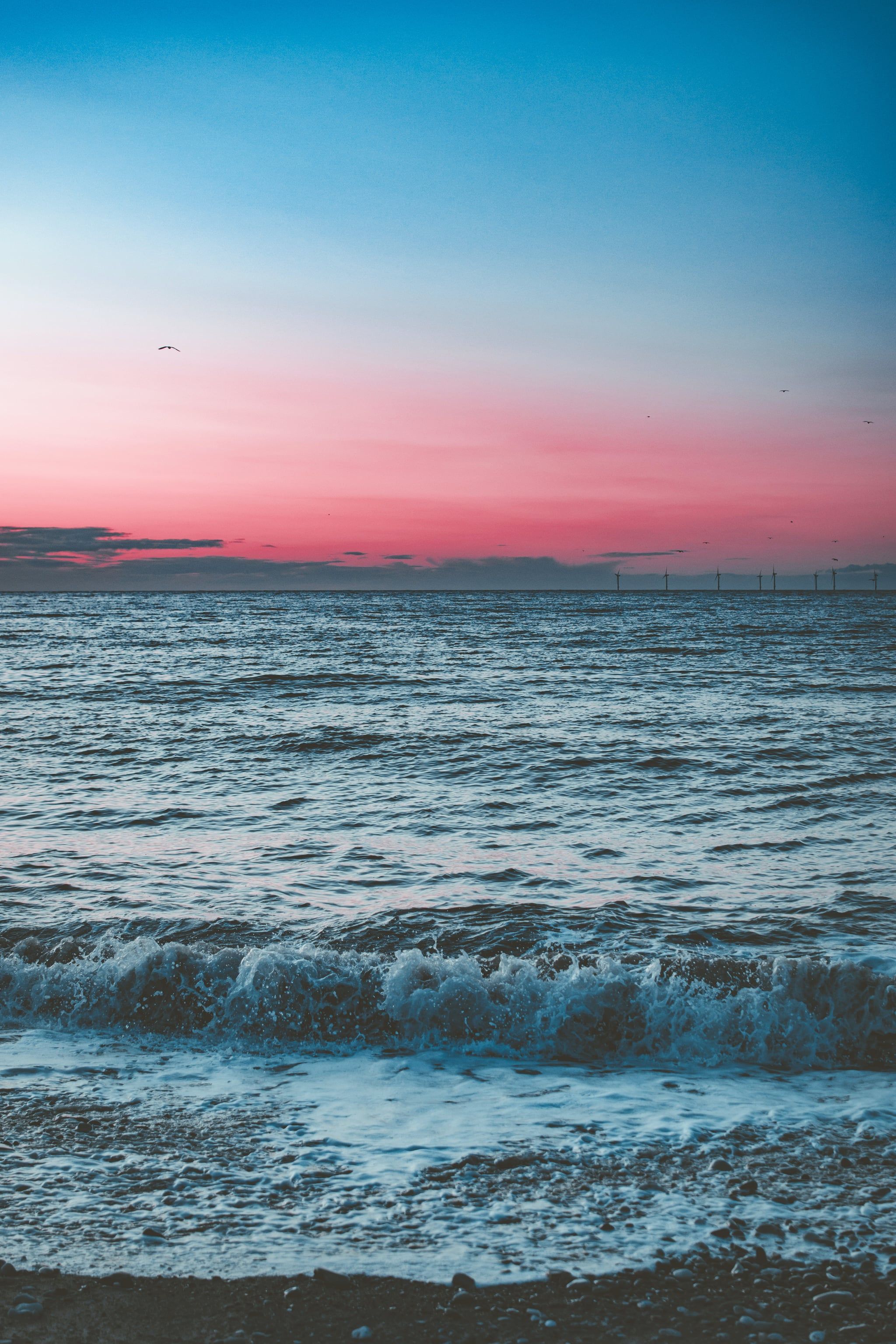 Meer, Wellen, Sonnenuntergang, Rosa Himmel, Horizont, iPhone 18 Pro, Handy-Hintergrund