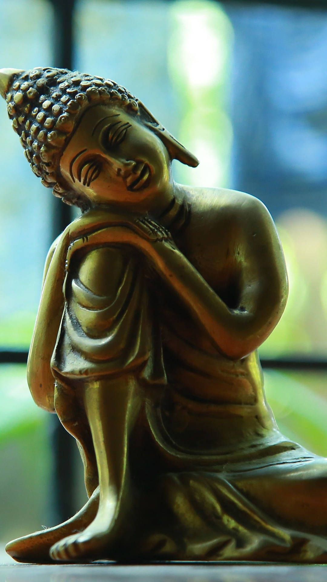 Ruhender Buddha, Figur, Bokeh, Nahaufnahme, Grüne Töne, Full HD, Sperrbildschirm fürs iPhone