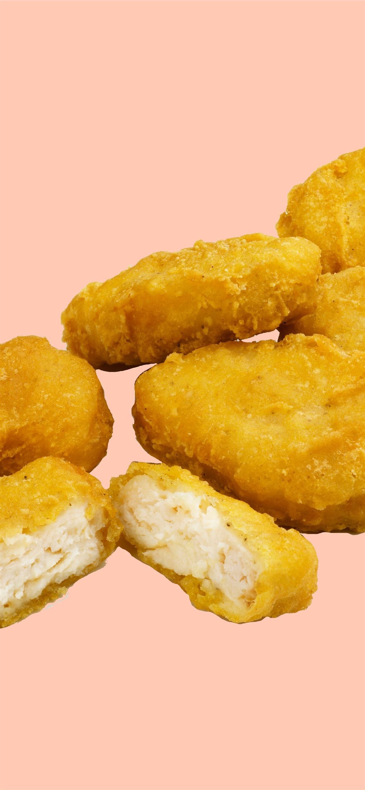 Chicken McNuggets, McDonald's, Fast Food, Pfirsichfarbener Hintergrund, Nahaufnahme, Sperrbildschirm