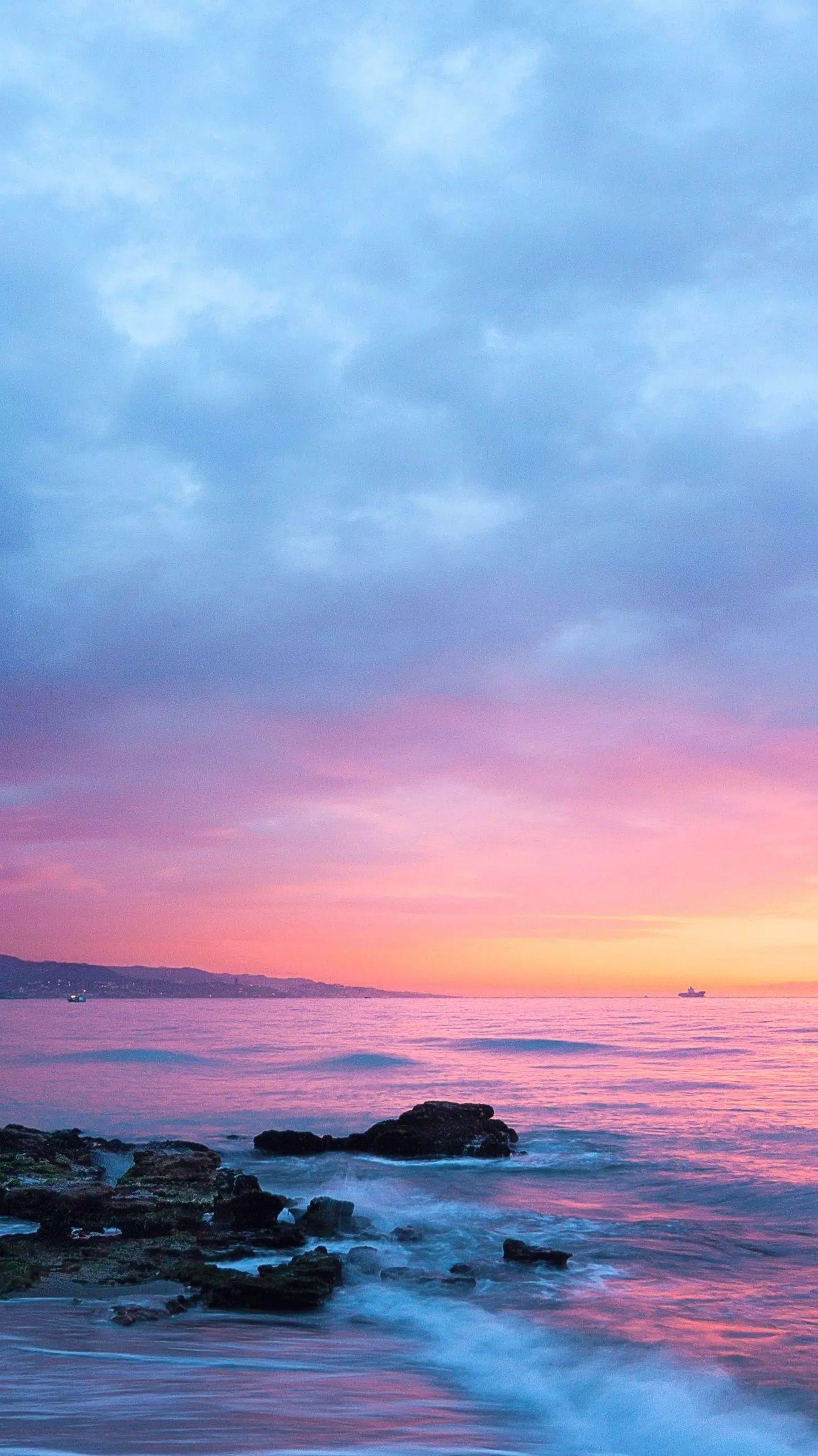 Sonnenuntergang, Felsenküste, Pastellhimmel, Langzeitbelichtung, Lila, QHD+, Handy-Hintergrund