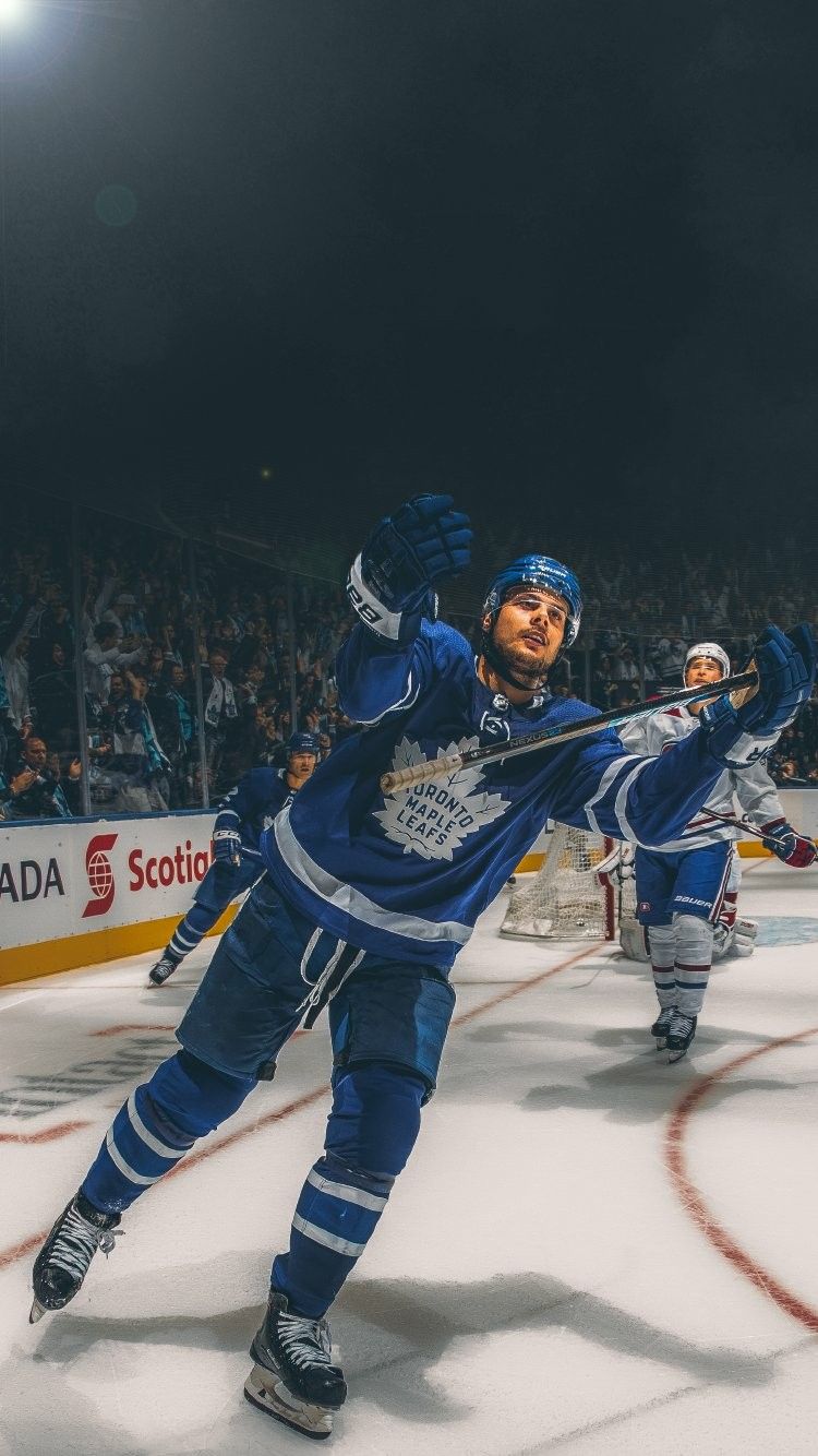 Toronto Maple Leafs, Spielszene, Eishockeyspieler, Arena, Blau, Hintergrundbild fürs Handy