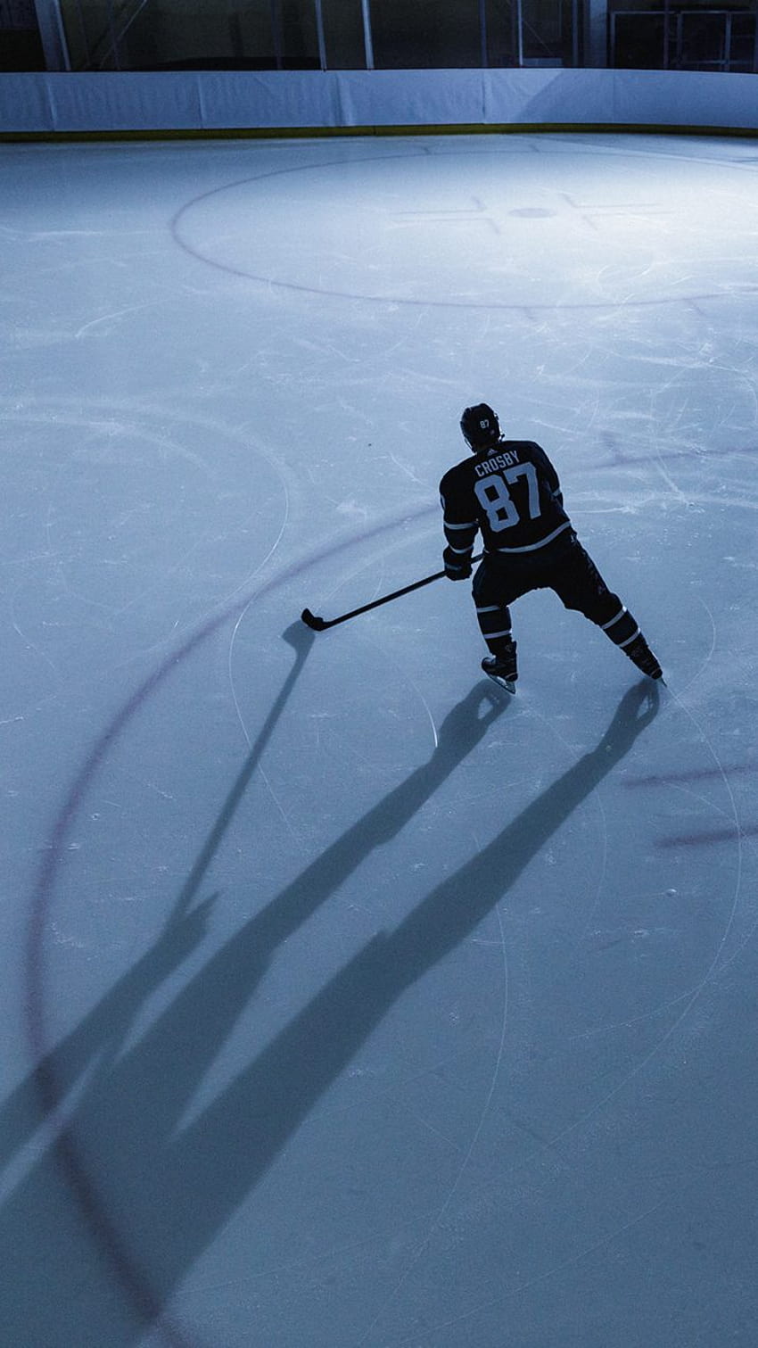 Eishockeyspieler, Langer Schatten, Eisfläche, Vogelperspektive, Minimalistisch, iPhone-Hintergrundbild