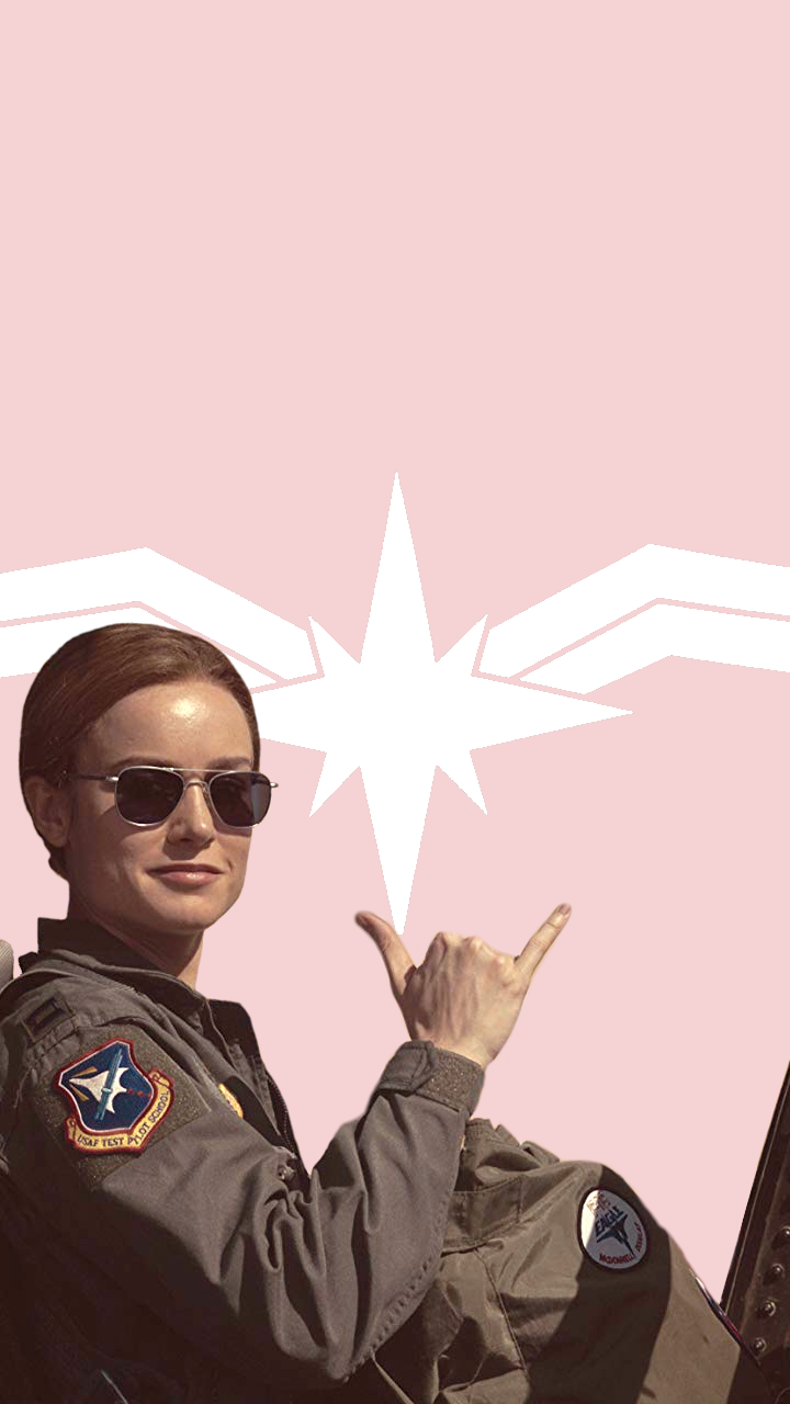 Carol Danvers, Brie Larson, Pilotin, Sonnenbrille, Rosa Hintergrund, Stern-Emblem, Sperrbildschirm