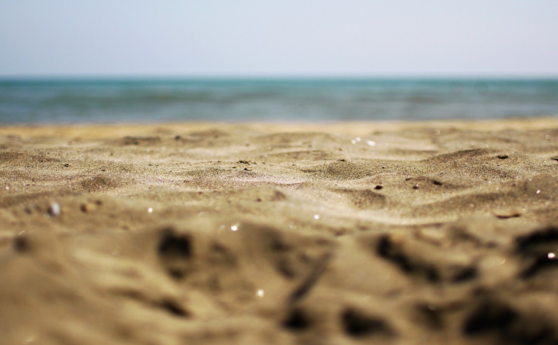 Sandstrand, Nahaufnahme, Meer, Unschärfe, 16:10, Full-HD-Hintergrundbild für den Desktop