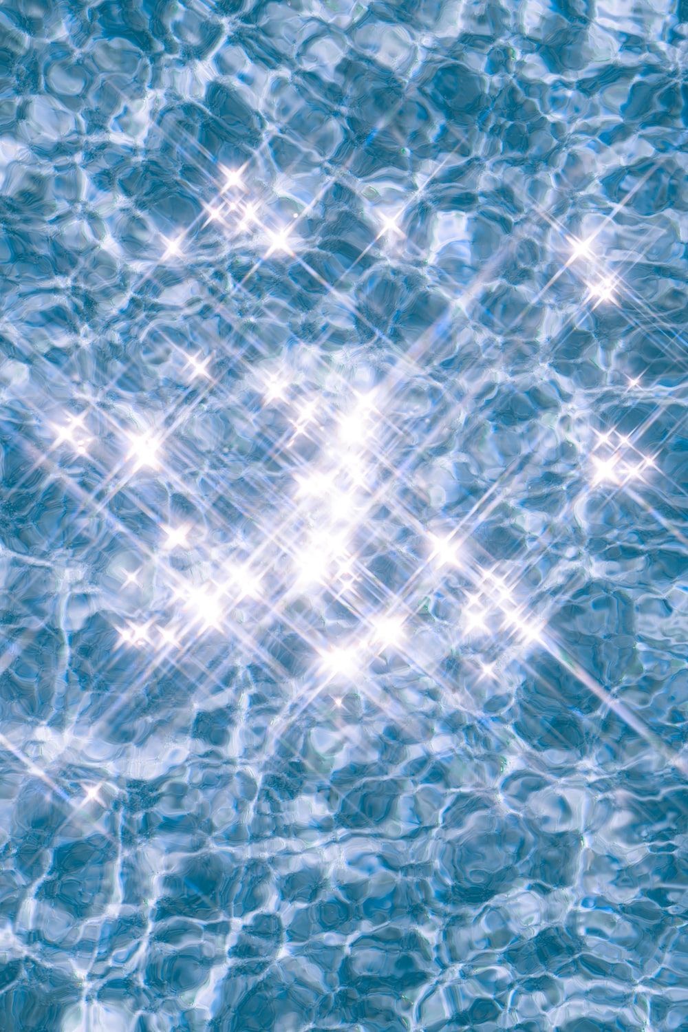 Glitzerndes Wasser, Blau, Lichtreflexe, Sterne, HD, Hintergrundbild fürs Handy