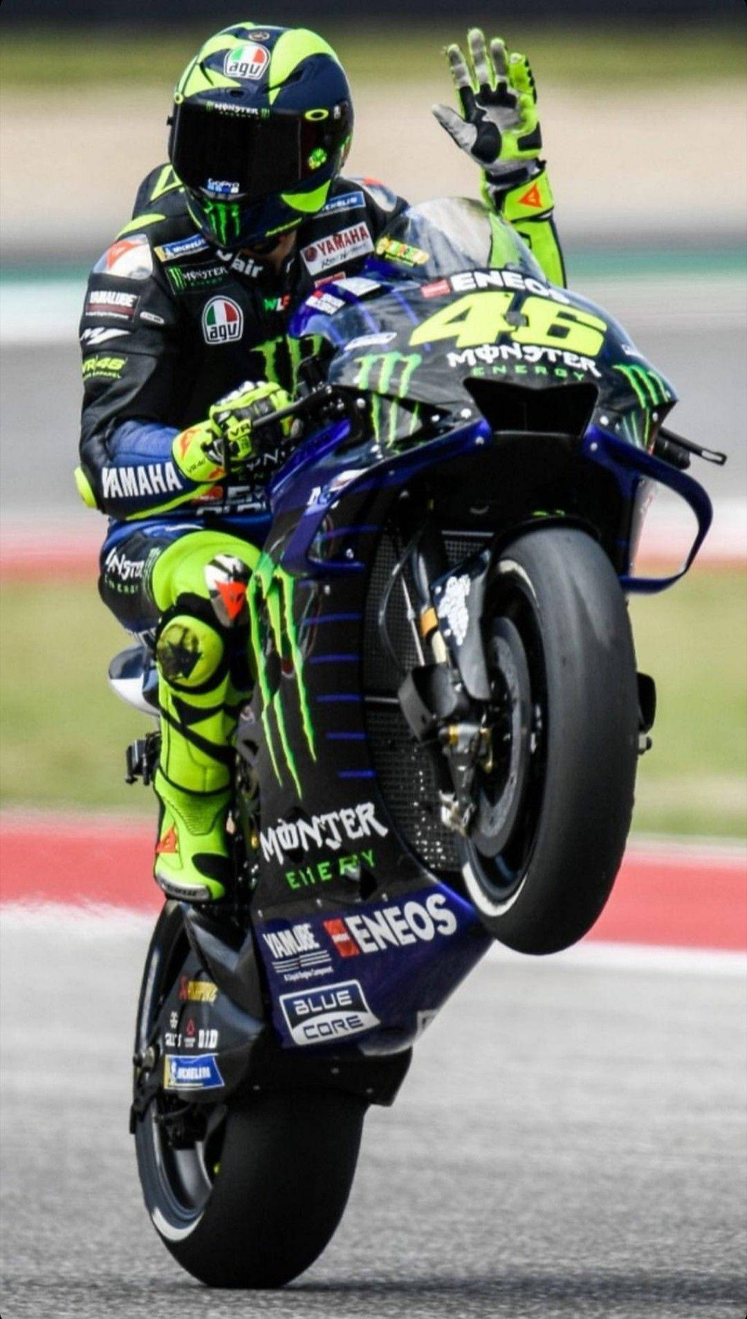Valentino Rossi, Movistar Yamaha, Wheelie, Siegerpose, MotoGP, Android-Hintergrundbild