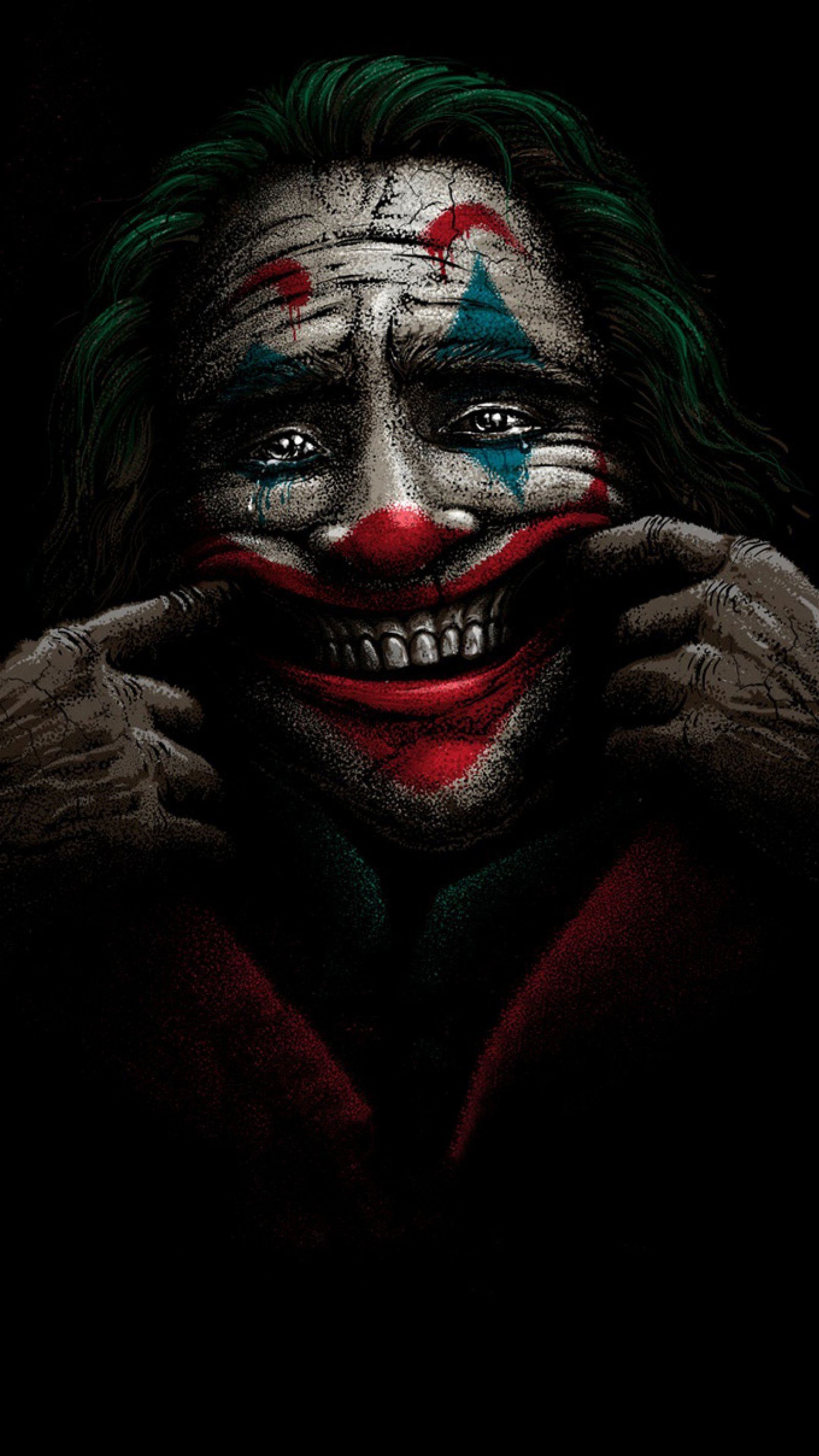 Joker, Joaquin Phoenix, Clownsschminke, Grinsen, Dunkel, QHD+, Handy-Hintergrundbild