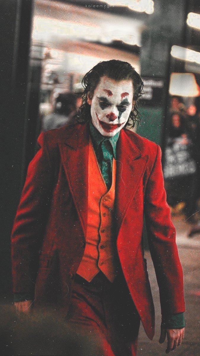Joker, Joaquin Phoenix, Roter Anzug, Clownsschminke, Straße, Android-Hintergrundbild