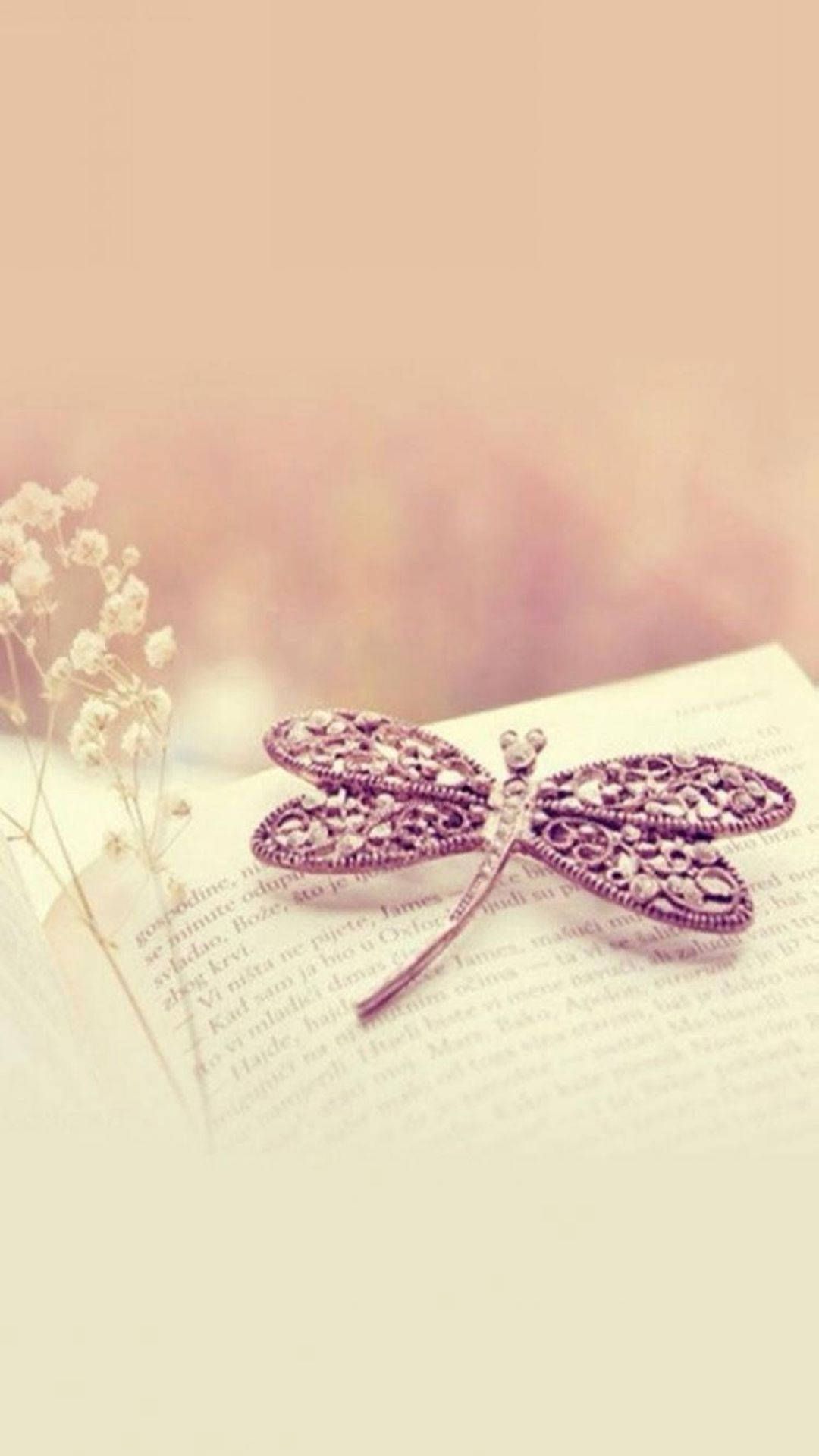 Libelle, Brosche, Buch, Pastellfarben, Vintage, iPhone-17e-Sperrbildschirm