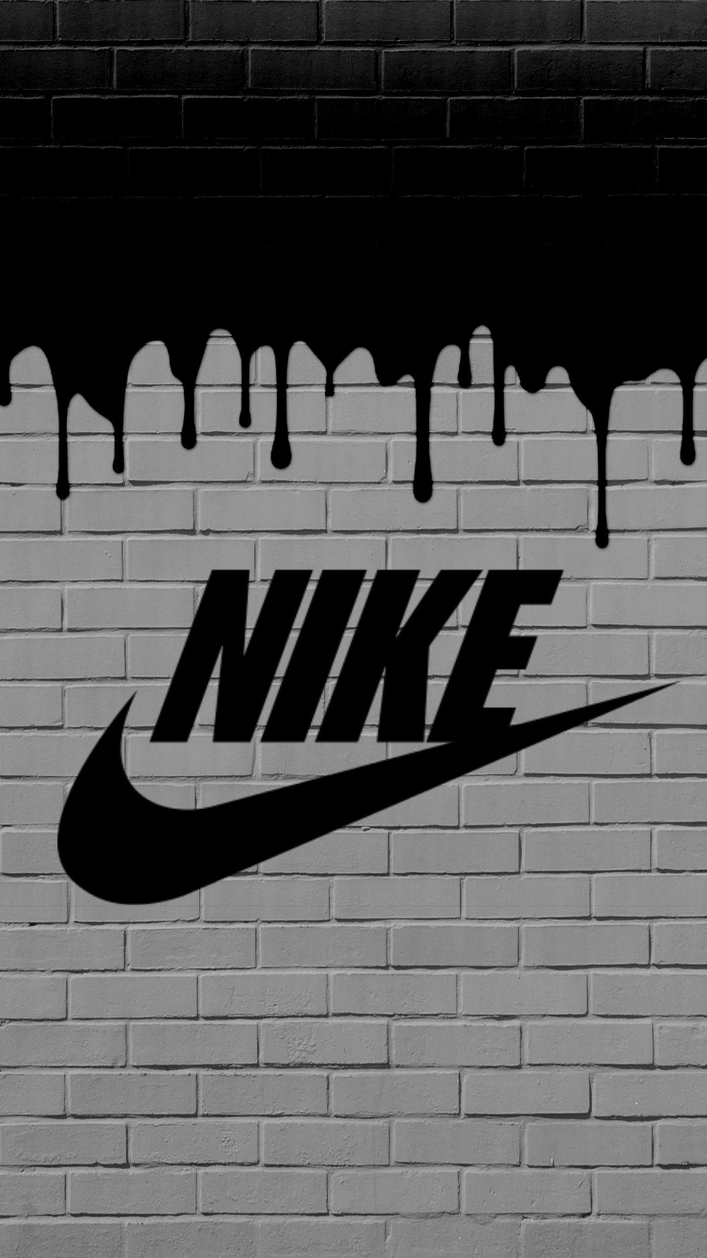 Nike-Logo, Backsteinwand, Tropfende Farbe, Grau, QHD+, Hintergrundbild fürs Handy