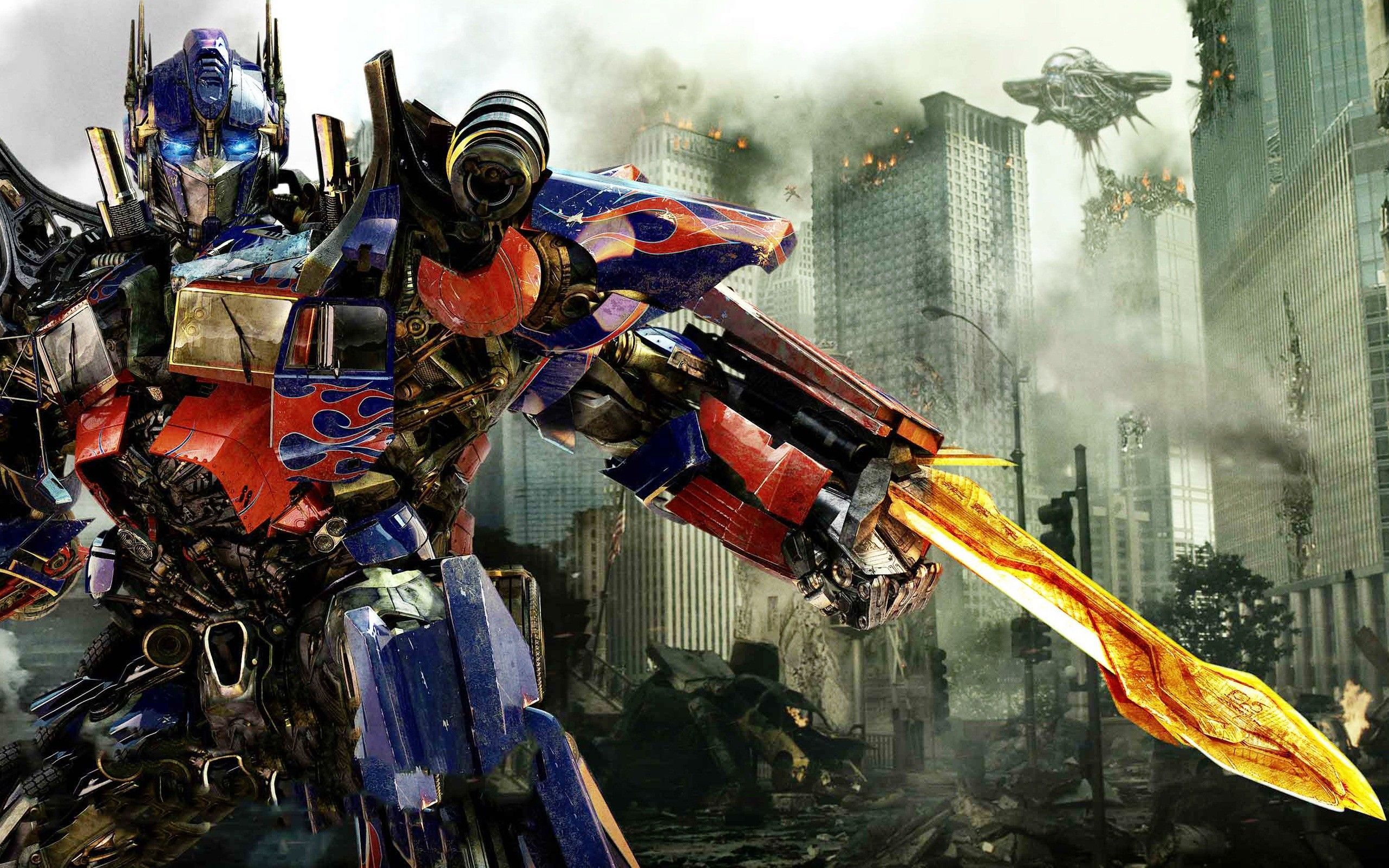 Optimus Prime, Transformers 3, Schwert, Zerstörte Stadt, Roboter, 2K, MacBook-Hintergrundbild