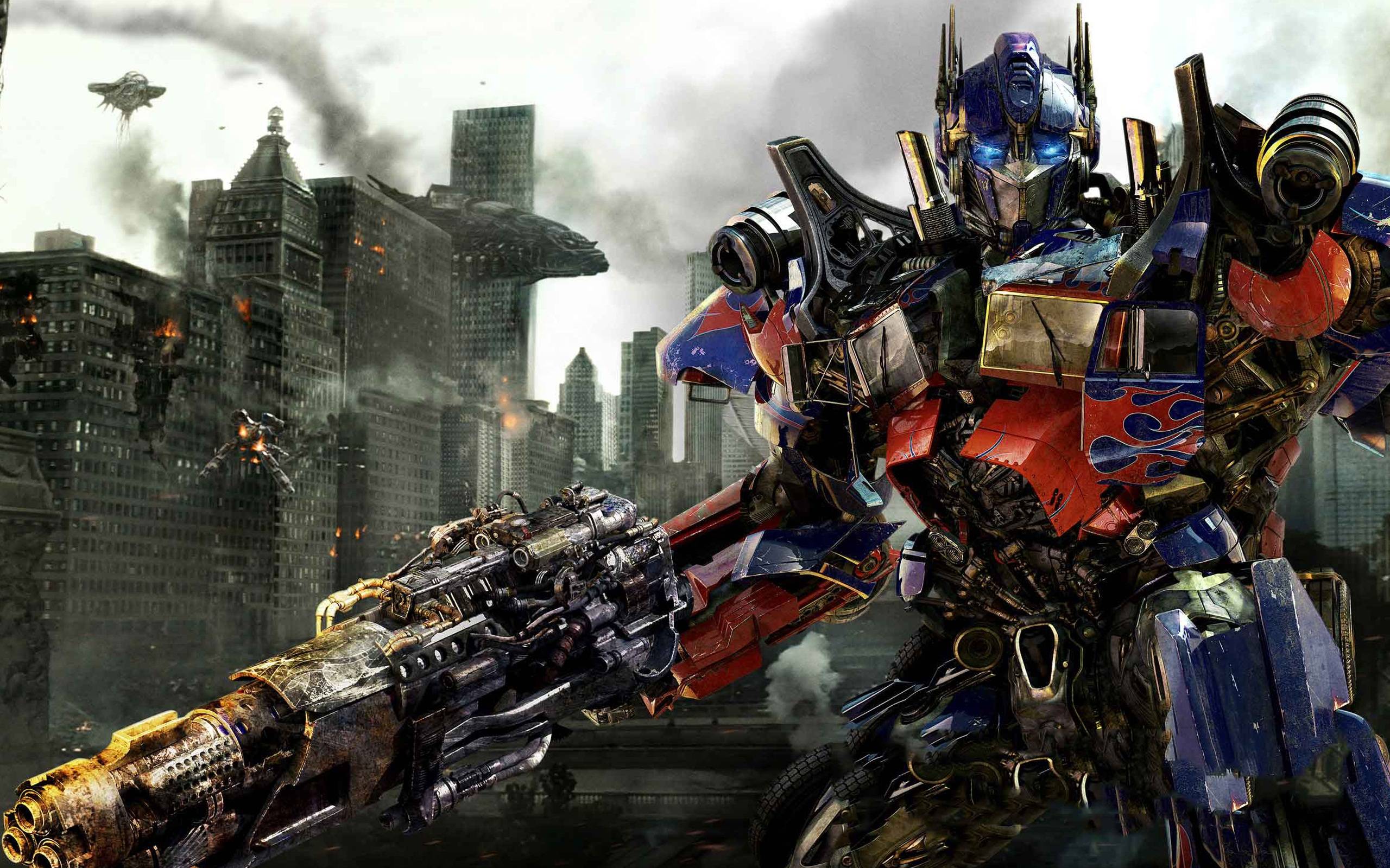 Optimus Prime, Transformers 3, Zerstörte Stadt, Waffe, Roboter, 2K-Hintergrundbild für PC