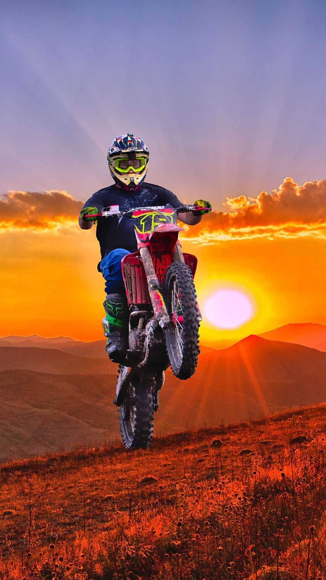 Motocross, Wheelie, Sonnenuntergang, Sonnenstrahlen, Fahrer, Hintergrundbild fürs Handy