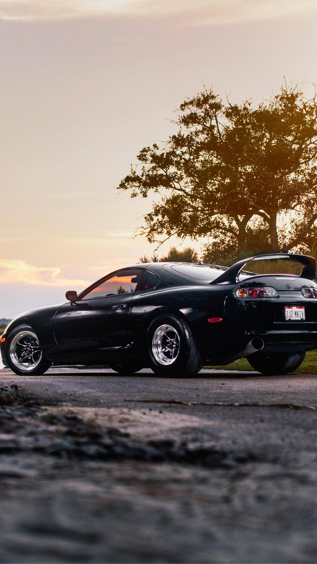 Toyota Supra MK4, Schwarz, Sonnenuntergang, Froschperspektive, 1080x1920, Handy-Hintergrund